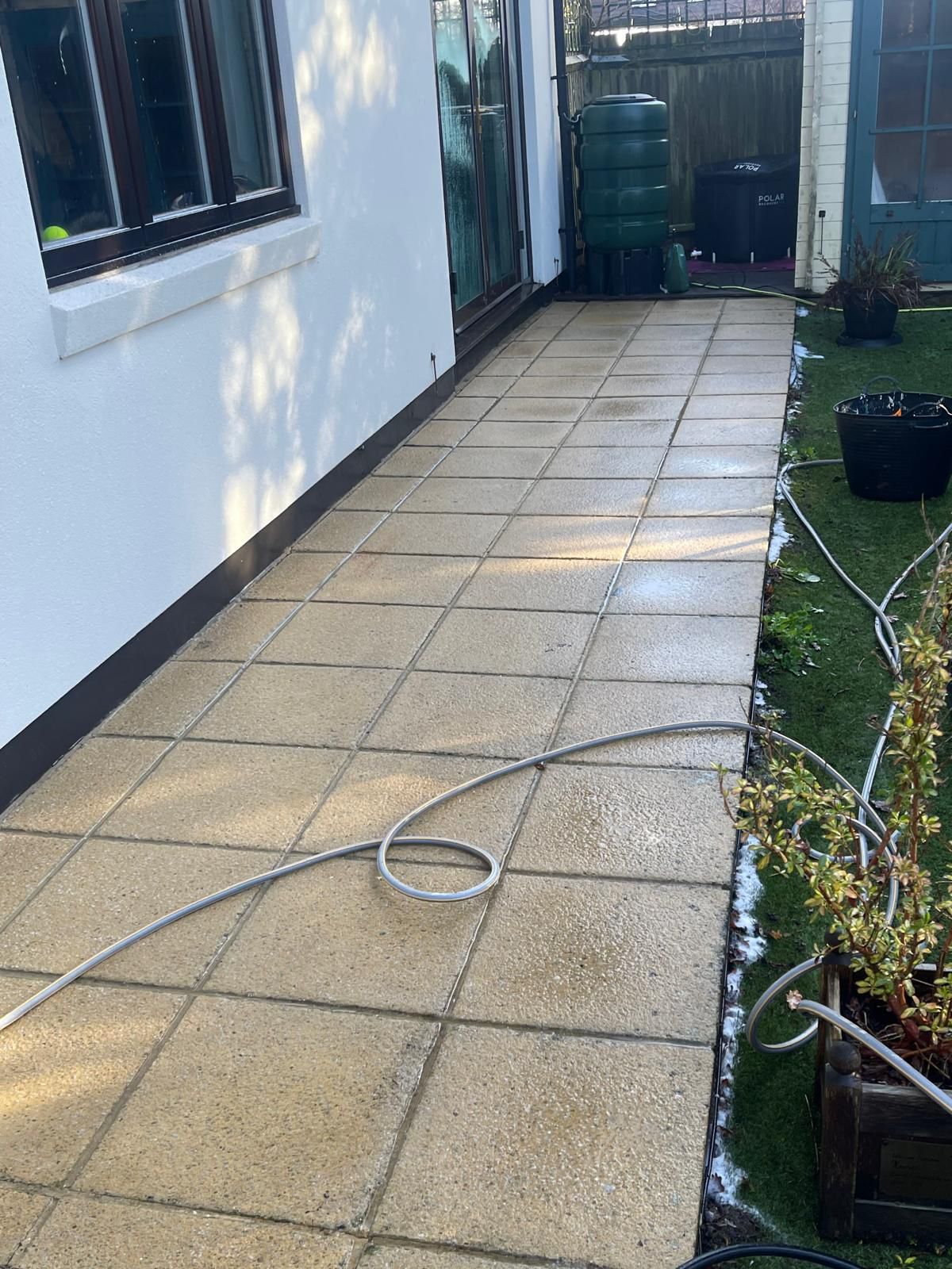 Exterior patio area during cleaning process